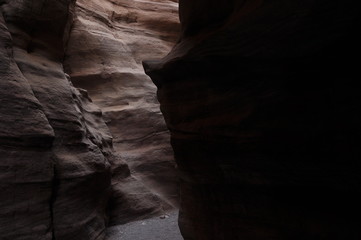 Red canyon in Israel near Eilat. Picturesque and undulating rocks hollowed out by rain in sandstone in the Negev desert.