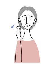 憂鬱な表情の年配女性／上半身