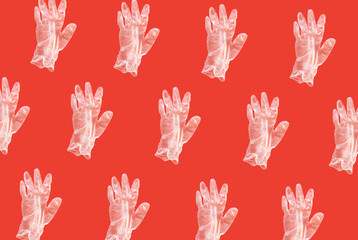 latex glove on a red background