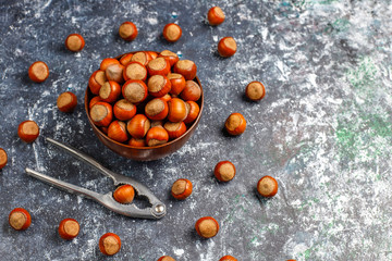 Hazelnuts on concrete background,top view