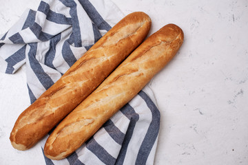 Freshly baked traditional bread on wooden table