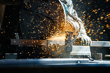 Spark flow from a machine tool in a manufacturing facility during metal cutting