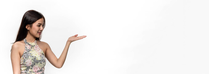 Young Asian woman raised hand on isolated white background with copy space for banner.