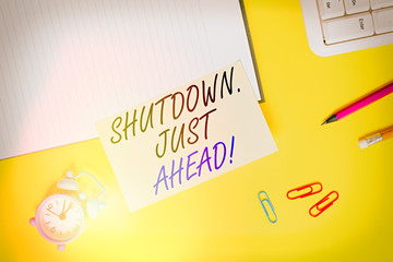 Writing note showing Shutdown Just Ahead. Business concept for closing factory business either...