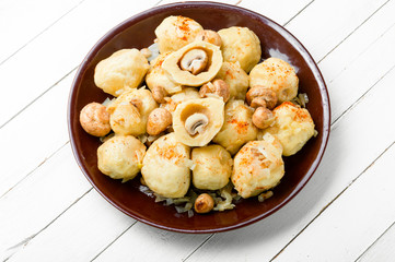 Homemade varenyky with mushrooms.