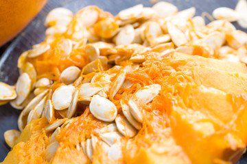 sliced and gutted orange pumpkin