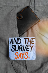 Conceptual hand writing showing And The Survey Says. Concept meaning written spoken results of...
