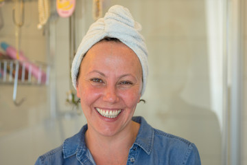 Natural happy woman laughing at the camera