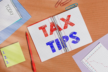 Word writing text Tax Tips. Business photo showcasing compulsory contribution to state revenue...