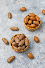 Pecan nuts on light background,top view