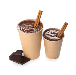 Cups of hot chocolate on white background