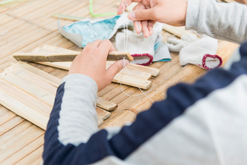  A man making traditional Chinese bamboo slips