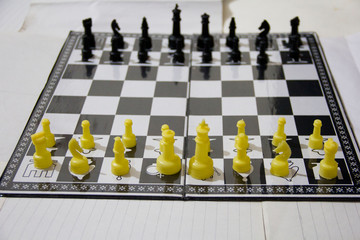 Chess board game to represent the business strategy with competition in the world market. and find...