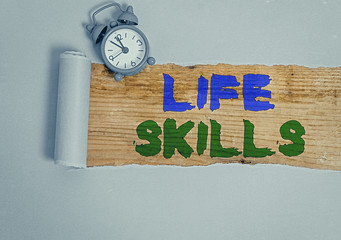 Writing note showing Life Skills. Business concept for skill that is necessary for full...