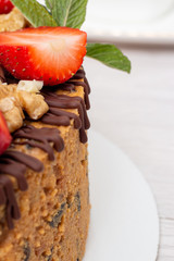 cake anthill with strawberries and nuts