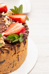 cake anthill with strawberries and nuts