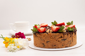 cake anthill with strawberries and nuts