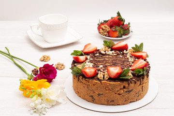 cake anthill with strawberries and nuts