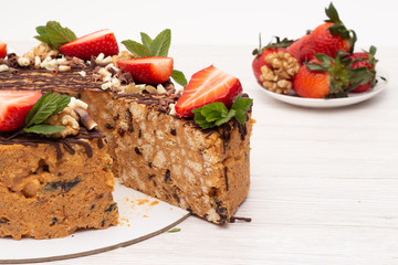 cake anthill with strawberries and nuts