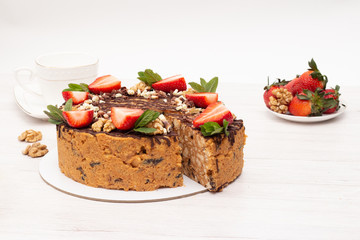 cake anthill with strawberries and nuts