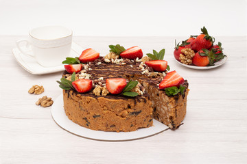 cake anthill with strawberries and nuts