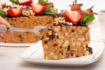 cake anthill with strawberries and nuts