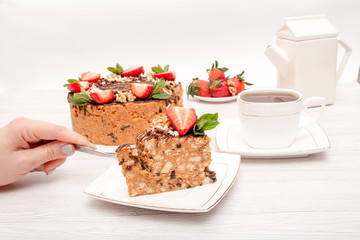cake anthill with strawberries and nuts