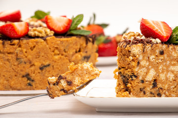 cake anthill with strawberries and nuts