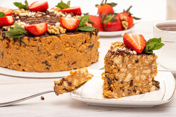cake anthill with strawberries and nuts