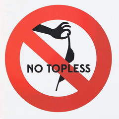sign forbidding topless sunbathing