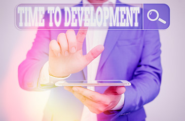 Conceptual hand writing showing Time To Development. Concept meaning a length of time during which...