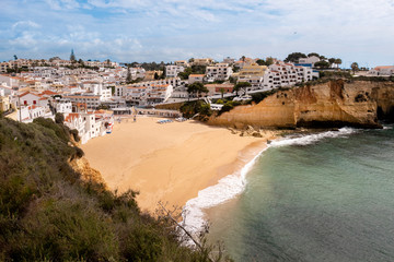 Fototapeta premium view to village of Carvoeiro with scenic beach in Portugal