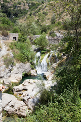 source of the Auso river and the ancient Roman bridge and the old water mill in Cilento and Vallo...