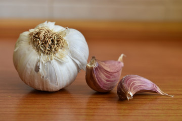Red Nubia garlic on wooden table Trapani, Italy