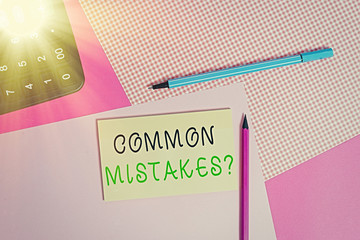 Writing note showing Common Mistakes Question. Business concept for repeat act or judgement...