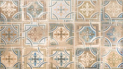 Old brown beige blue vintage shabby patchwork tiles stone concrete cement wall texture background