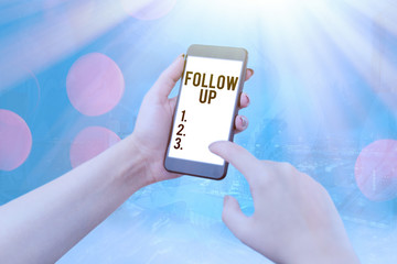 Conceptual hand writing showing Follow Up. Concept meaning a continuation of something that has...