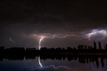 Lightning over river