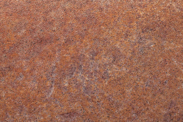 Grainy dark brown background with black spots. Texture backdrop with small crumb pattern for interior design.