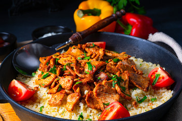 rustic bulgur pans with gratinated gyros and yoghurt