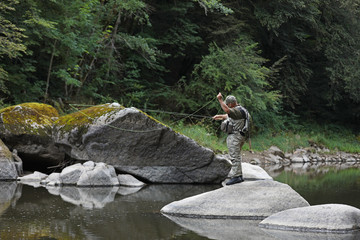 Fishing scene, newbie fly fisherman 