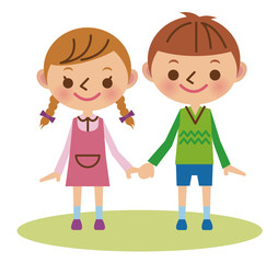 手をつなぐ幼い男の子と女の子