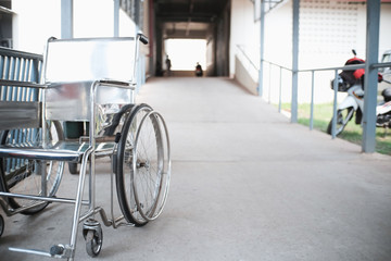 Fototapeta premium wheelchair in hospital corridor