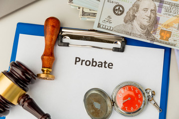 Probate sign, stack of papers and gavel.