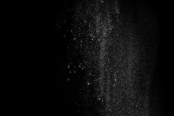 Fototapeta na wymiar Gorgeous white powder pattern isolated on black background