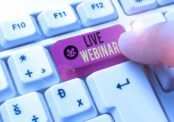 Conceptual hand writing showing Live Webinar. Concept meaning seminar that is transmitted over the...
