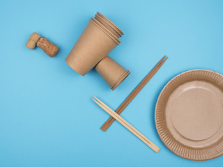Kitchen items from natural organic materials against a blue background.