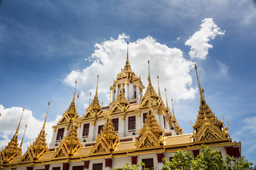 Fototapeta premium Roof of a temple in Thailand. Traditional Thai style pattern on the roof of a temple.