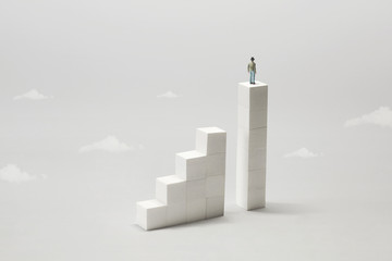 man from the top of stairs observing the future; surreal concept