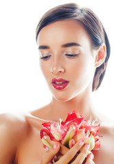 Naklejka na ściany i meble young pretty brunette woman with red flower amaryllis close up isolated on white background. Fancy fashion makeup, bright lipstick, creative Ombre manicured nails. spa skin care